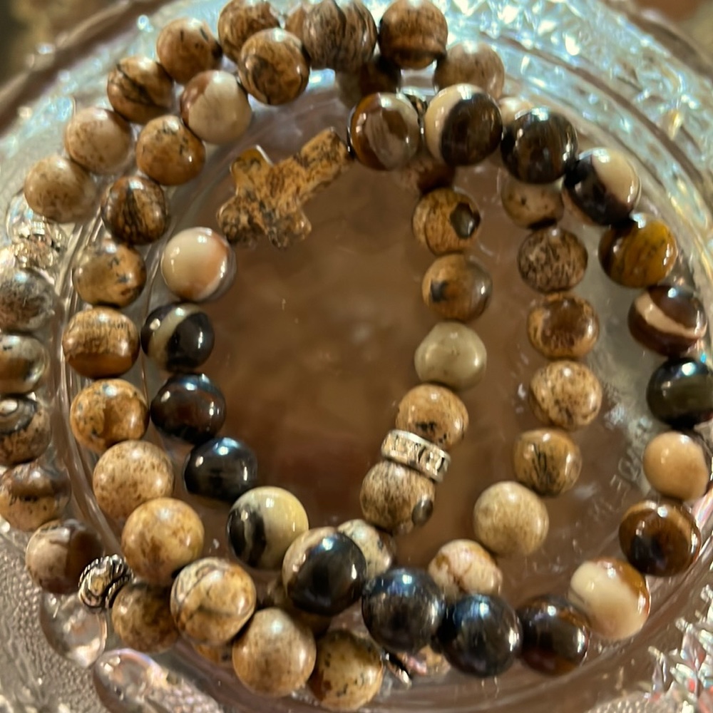 Set of three semi precious stone bracelets.